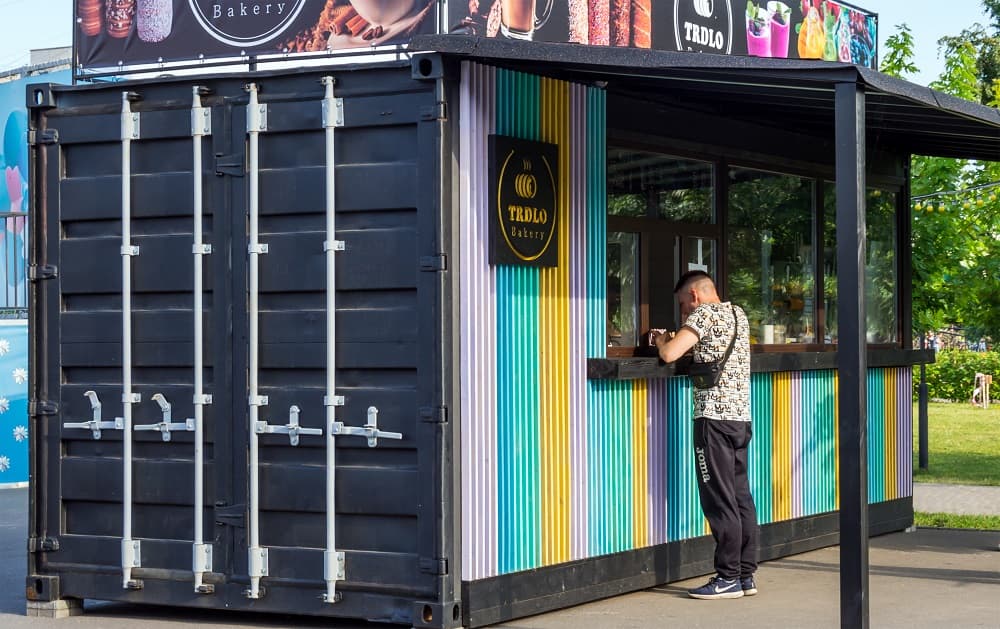 A shipping container cafe at a park